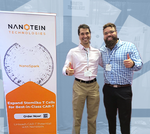 Nanotein team smiling at a conference